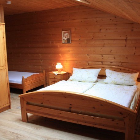 Schlafzimmer, © im-web.de/ Tourist-Information Bayrischzell